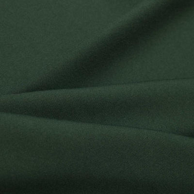 Ткань костюмная 21010 2076, 225 гр/м2, шир.150см, цвет т.зеленый - купить в Старом Осколе. Цена 390.73 руб.